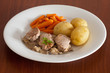 pork meat with potatoes and carrot