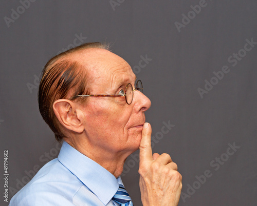 Photo: Mann beim Nachdenken - Man Thinking Mann beim Nachdenken - Man Thinking