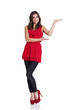 Young woman presenting something.