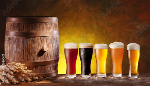 Photo: Beer glasses with a wooden barrel. Beer glasses with a wooden barrel.