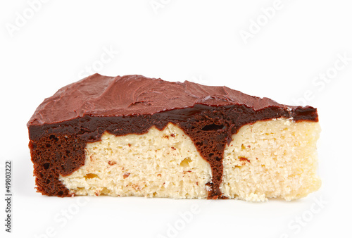 Photo: chocolate and coconut cake slice isolated on white chocolate and coconut cake slice isolated on white