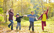 Happy kids and autumn leaves