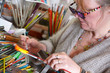 Glass Artist in her workshop.