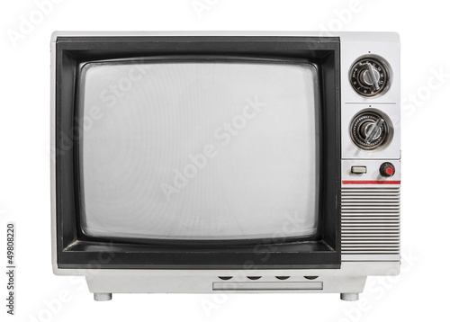 Photo: Grungy vintage portable television isolated with turned off scre Grungy vintage portable television isolated with turned off scre