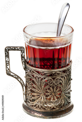 Photo: black tea in retro glass black tea in retro glass