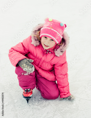 Photo: girl in skate on the ice girl in skate on the ice