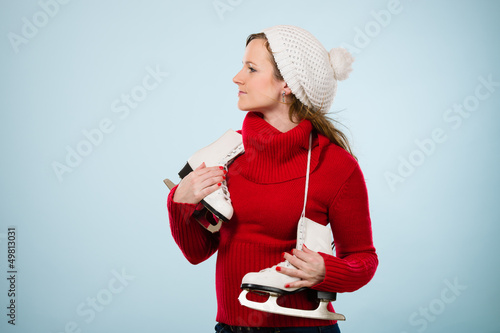 Photo: Woman and skates Woman and skates
