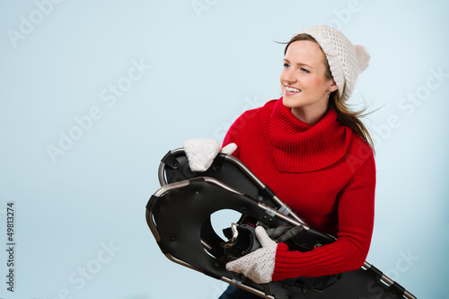 Photo: Woman and snowshoes Woman and snowshoes