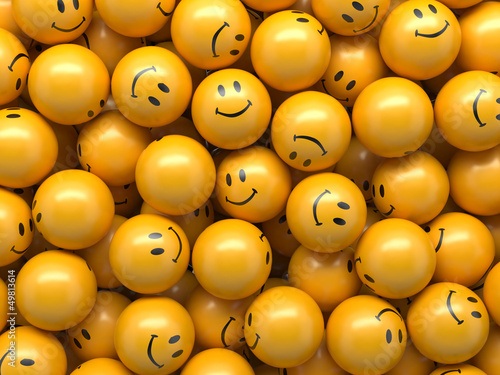 Photo: yellow balls with funny smiley faces yellow balls with funny smiley faces