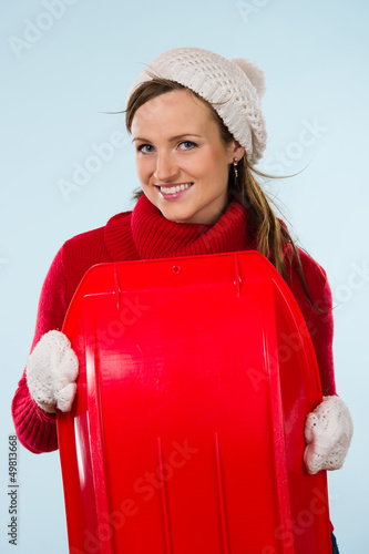 Photo: Woman and sled Woman and sled