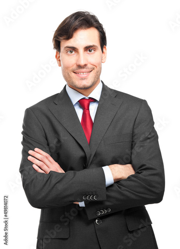 Photo: Smiling businessman isolated on white Smiling businessman isolated on white