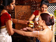 Woman having Ayurvedic spa treatment.