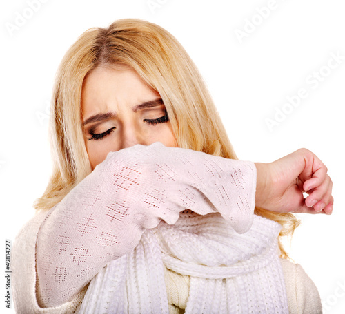 Photo: Young woman with handkerchief having cold. Young woman with handkerchief having cold.