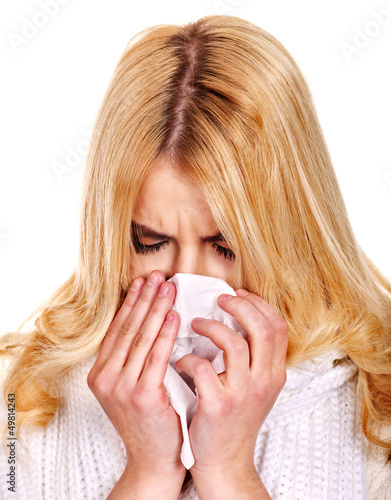Photo: Young woman with handkerchief having cold. Young woman with handkerchief having cold.