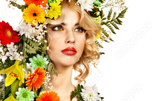 Photo: Woman with make up and flower. Woman with make up and flower.