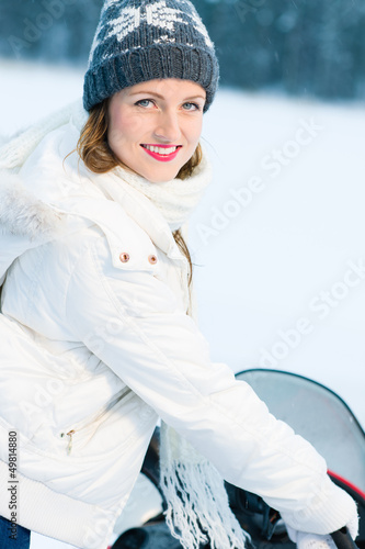 Photo: Woman and snowmobile Woman and snowmobile