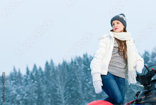 Photo: Woman and snowmobile Woman and snowmobile