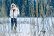 Photo: Woman and snowshoes Woman and snowshoes