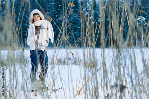 Photo: Woman and snowshoes Woman and snowshoes