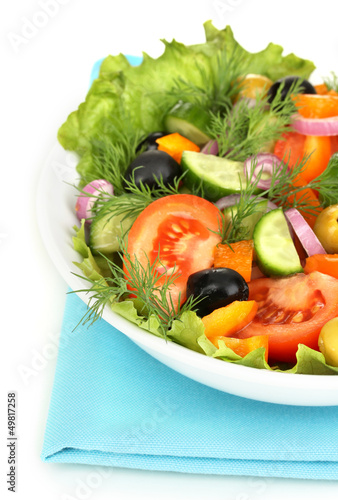 Photo: Fresh salad in plate isolated on white Fresh salad in plate isolated on white