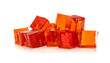 Orange jelly cubes on white background