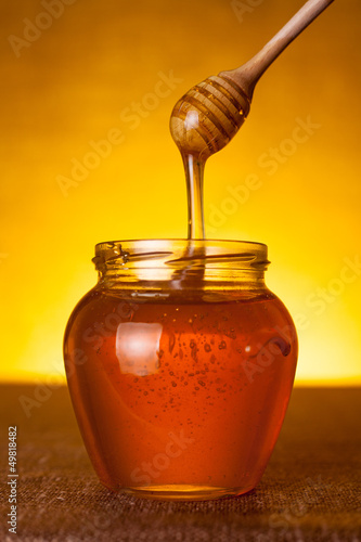 Photo: Honey jar with dipper Honey jar with dipper