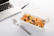 Eating a pasta salad in the office