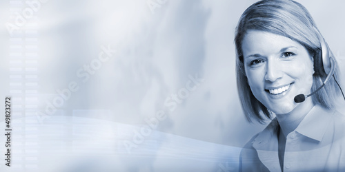 Photo: Call center operator woman. Call center operator woman.