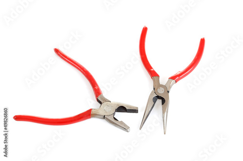 Photo: red pliers isolated on white red pliers isolated on white