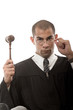 Photo: Attractive hispanic african american judge holding gavel Attractive hispanic african american judge holding gavel