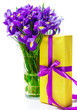 Foto: Present and flowers in vase Present and flowers in vase