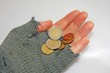 hand of the poor man who asks the charity to a few euros