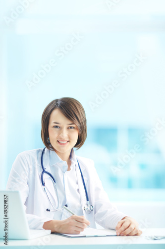 Photo: Portrait of a doctor Portrait of a doctor