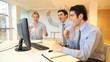 Successful businesspeople shouting in front of desktop
