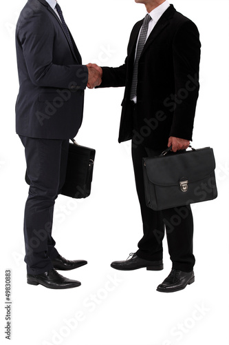 Photo: businessmen shaking hands businessmen shaking hands