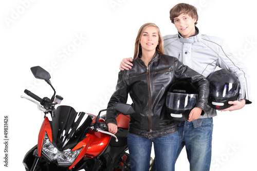 Photo: Couple stood with motorcycle Couple stood with motorcycle