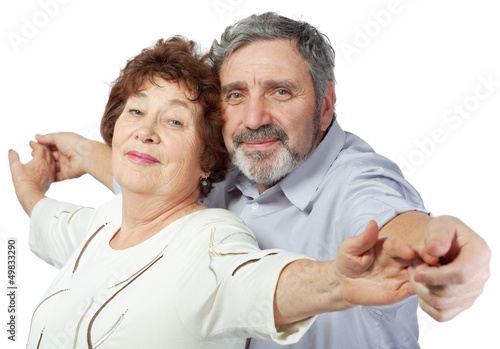 Photo: Smiling elderly couple holding hands Smiling elderly couple holding hands