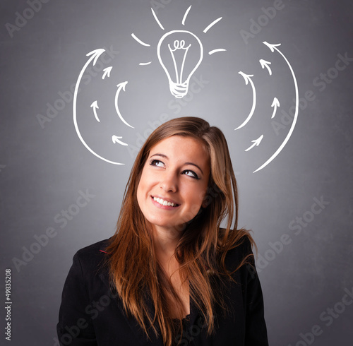 Photo: Pretty lady thinking with arrows and light bulb overhead Pretty lady thinking with arrows and light bulb overhead