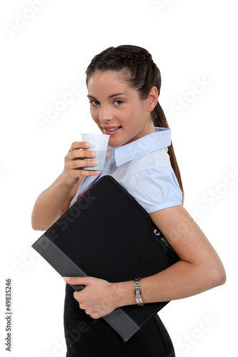 Photo: secretary drinking coffee secretary drinking coffee