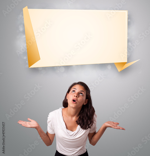 Photo: attractive woman lookint modern origami copy space attractive woman lookint modern origami copy space