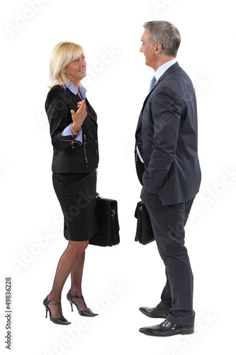 Photo: Businesspeople making small talk Businesspeople making small talk