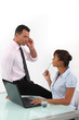Flirtatious business duo