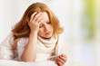 Photo: Woman with thermometer sick colds, flu, fever, headache in bed Woman with thermometer sick colds, flu, fever, headache in bed