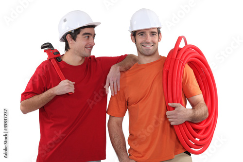 Photo: Two plumber friends Two plumber friends
