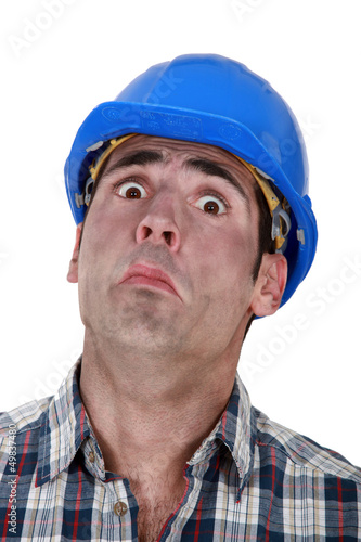 Photo: A fearful construction worker A fearful construction worker