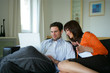 Photo: couple resting on the couch couple resting on the couch