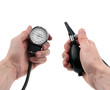 Hands holding a sphygmomanometer isolated