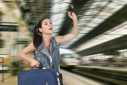 Photo: Woman waving goodbye to her loved one Woman waving goodbye to her loved one