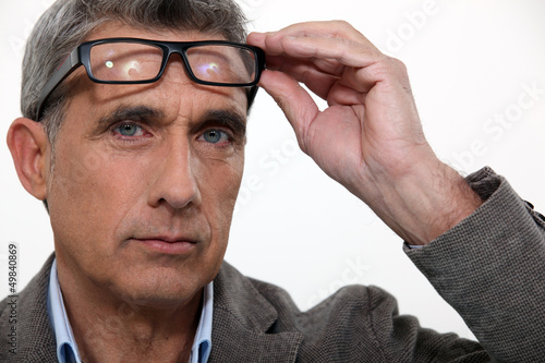 Photo: Man raising his glasses Man raising his glasses