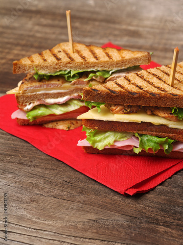 Photo: Club sandwich on napkin Club sandwich on napkin